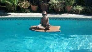 boy in pool meditating - connected kids - learn to teach meditation