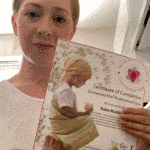 katie maddocks holding connected kids certificate