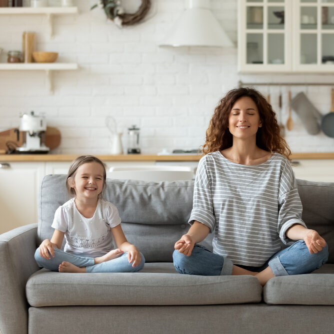 parents meditating with children