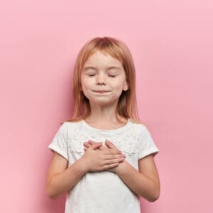 self soothe mindfully for kids and teens girl holding her heart