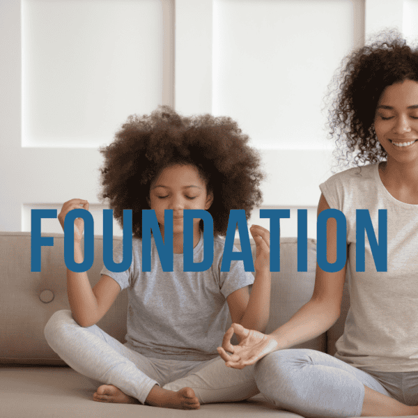 girl and her mum meditating together on a sofa meditation for kids - mindful parenting