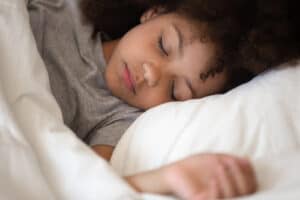 helping children sleep with meditation - girl asleep