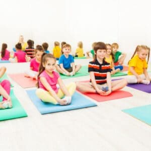 children meditating in class