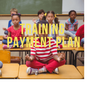 children sitting on desk meditating